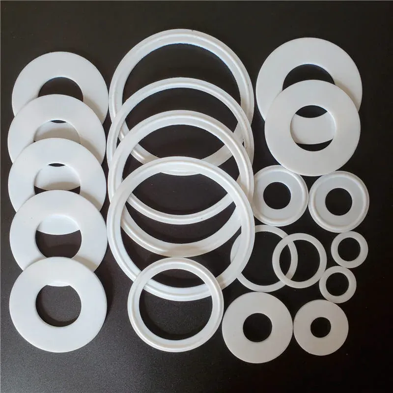 White PTFE gaskets in multiple shapes and sizes